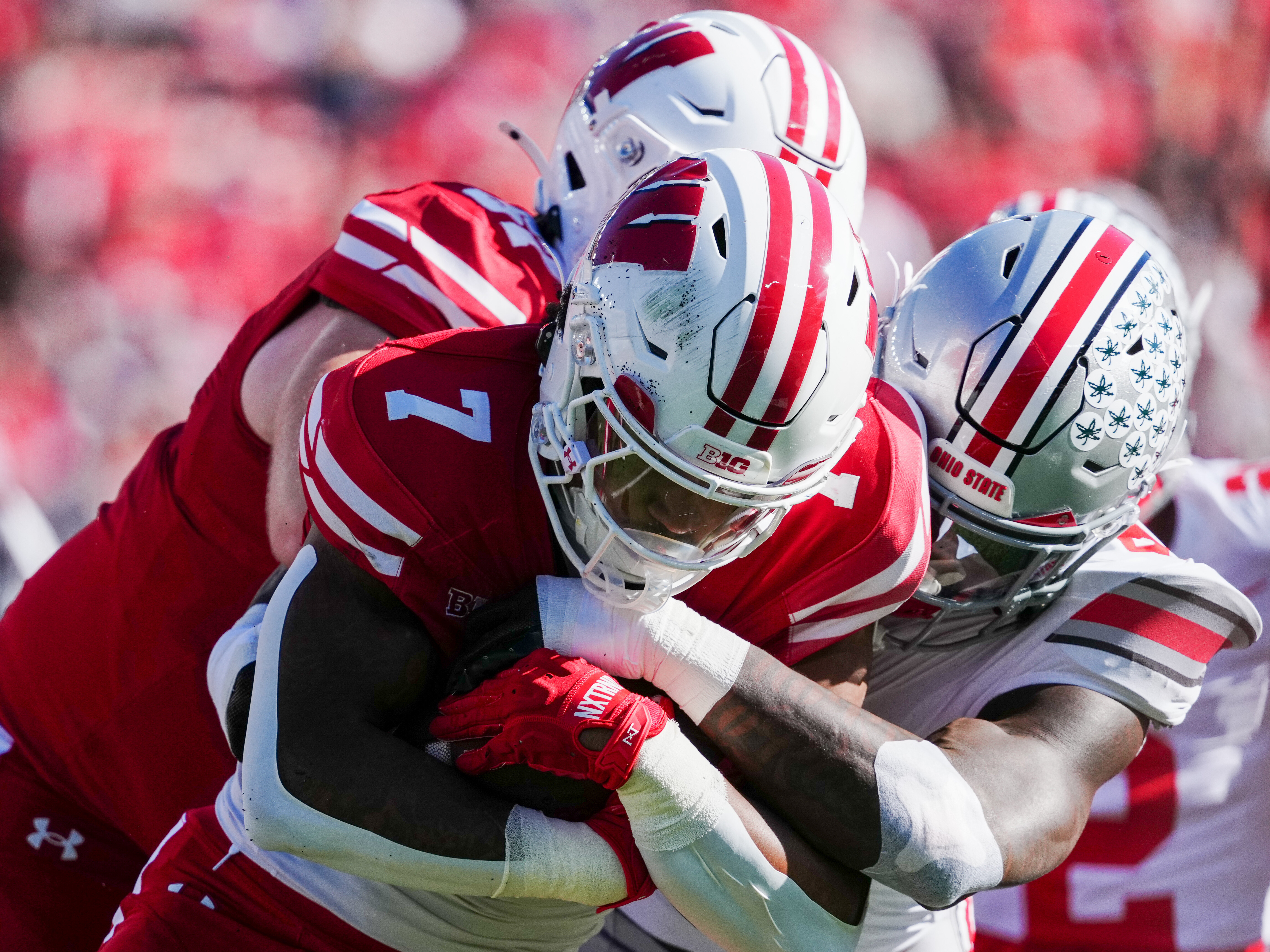 Oct 18, 2025; Madison, Wisconsin, USA; Wisconsin Badgers running back Dilin Jones (7) runs the ball in the first quarter against the Ohio State Buckeyes at Camp Randall Stadium on October 18, 2025 in Madison, Wisconsin. Photography by Ross Harried for Second Crop Sports.